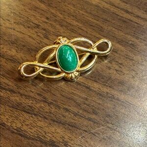 Elegant Gold and Green Brooch